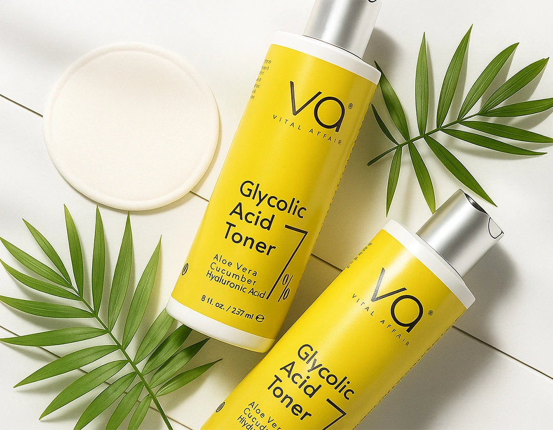 Vital affair glycolic acid 7% toner in a table with leaves and skincare pad