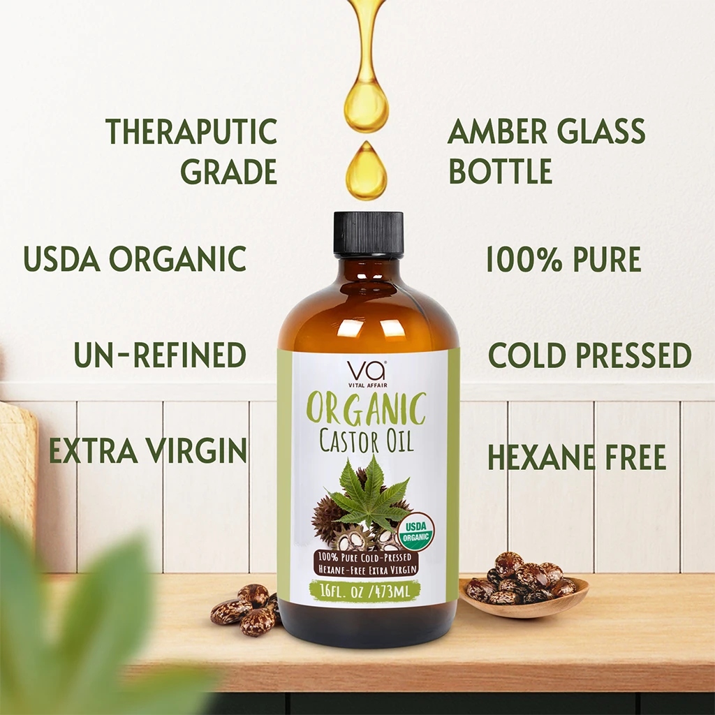 Bottle of organic castor oil with label details on a wooden surface.