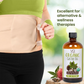 Person wearing a castor oil belt with a bottle of Organic Castor Oil on a natural background