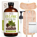 Organic castor oil with wrap pack packaging, pump, and pouch on a white background