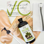 Organic castor oil with wrap pack with a branded card on a beige bag