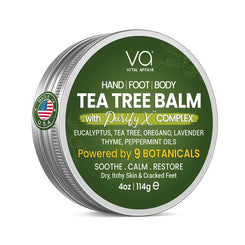 Tea tree balm container with green label and silver lid on a white background