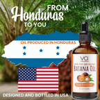 Bottle of banana oil with a label indicating it's produced in Honduras and designed in the USA, set against a map of the USA and Honduras.