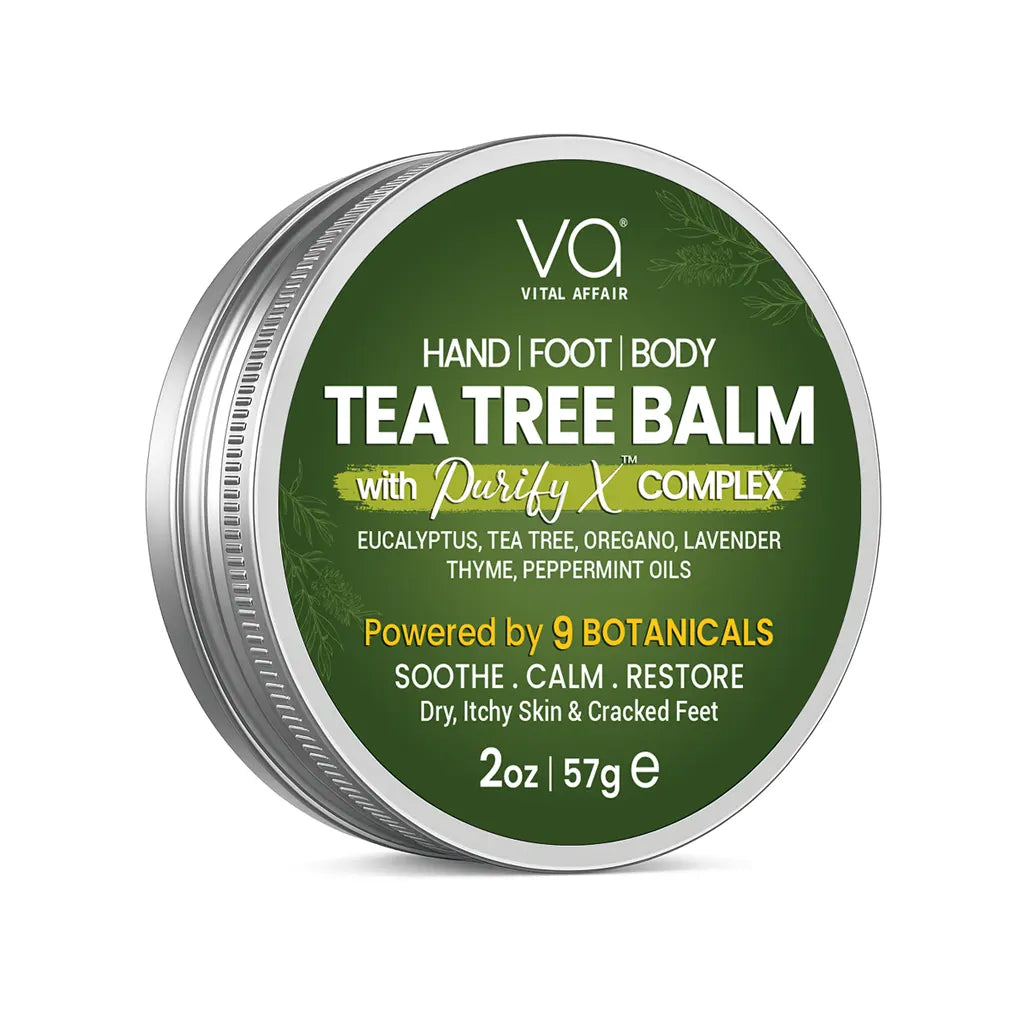 A round silver metal tin of Vital Affair Tea Tree Balm with a dark green label, shown on a clean white background.